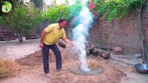 Tandoor Fitting in the Earth for Cooking Recipes. by Data Food