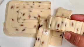 Mix egg white with sugar and almonds! You will be overwhelmed with this recipe! Very easy Nougat!